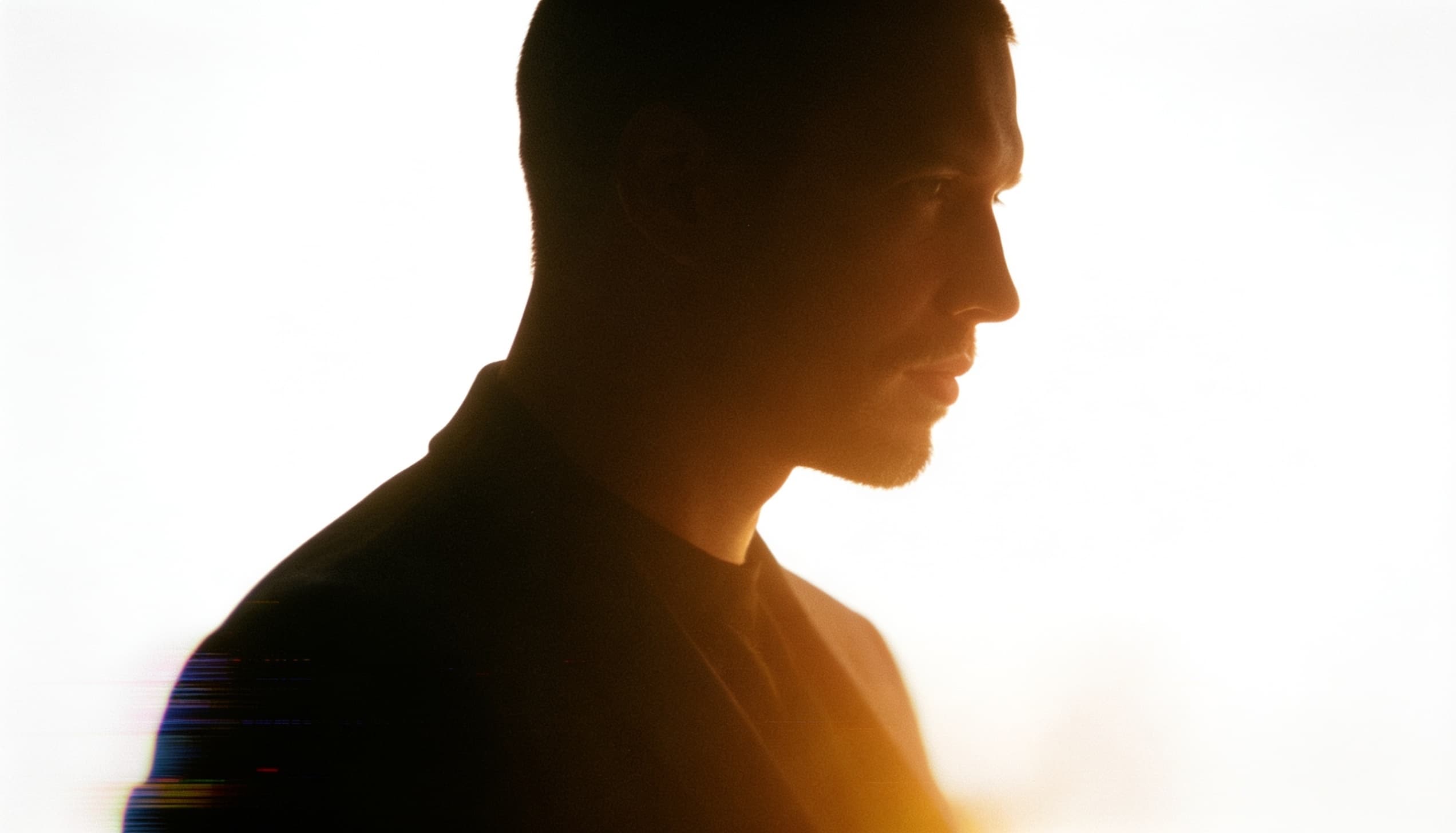 Tommaso Nervegna, backlit profile portrait